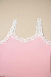Pink ribbed cami with white lace trim and adjustable straps