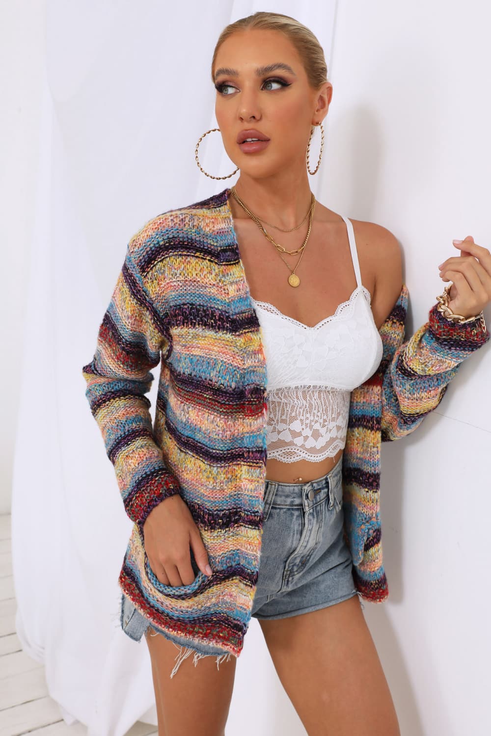 Rainbow stripe open-front knit cardigan with pockets, acrylic material, long sleeves.