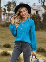Sky blue textured knit henley with balloon sleeves and button detail
