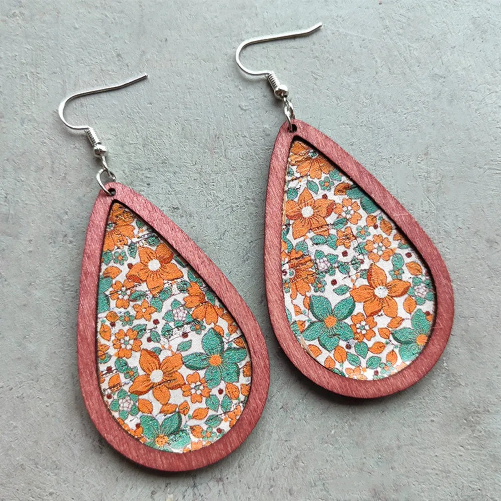 Teardrop woodgrain earrings with orange and teal floral pattern