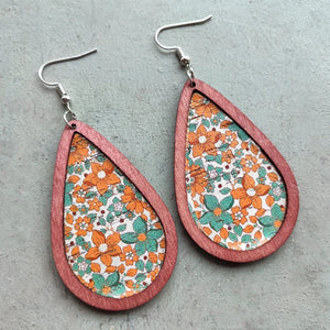 Teardrop woodgrain earrings with orange and teal floral pattern