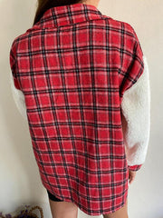 Plaid shacket with sherpa sleeves in red and black plaid.
