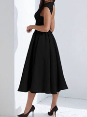 Black cap sleeve a-line midi dress with a boat neck and open back.