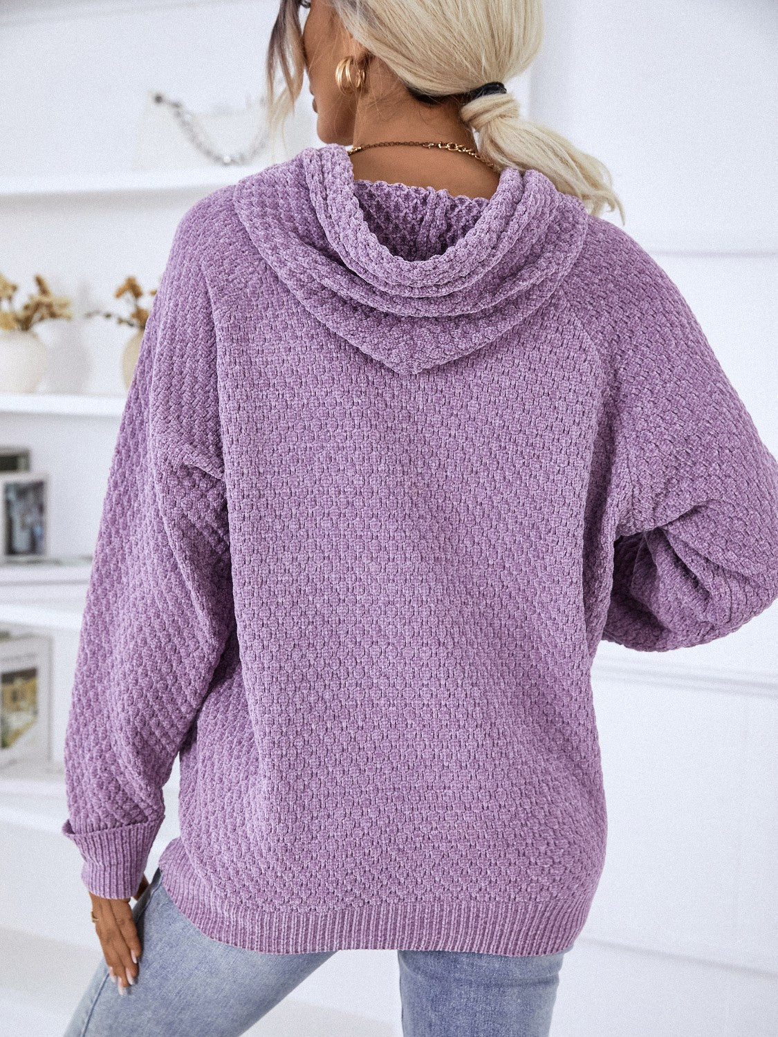 Lavender textured knit raglan sleeve hoodie with a cowl neck and ribbed cuffs and hem.