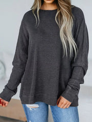 Dark gray waffle knit oversized sweatshirt with crew neck and long sleeves.