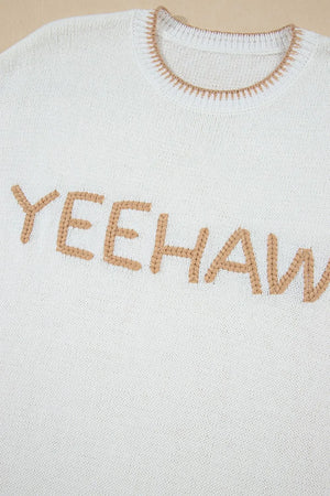 White knit sweater with embroidered Yeehaw text and stitch trim neckline