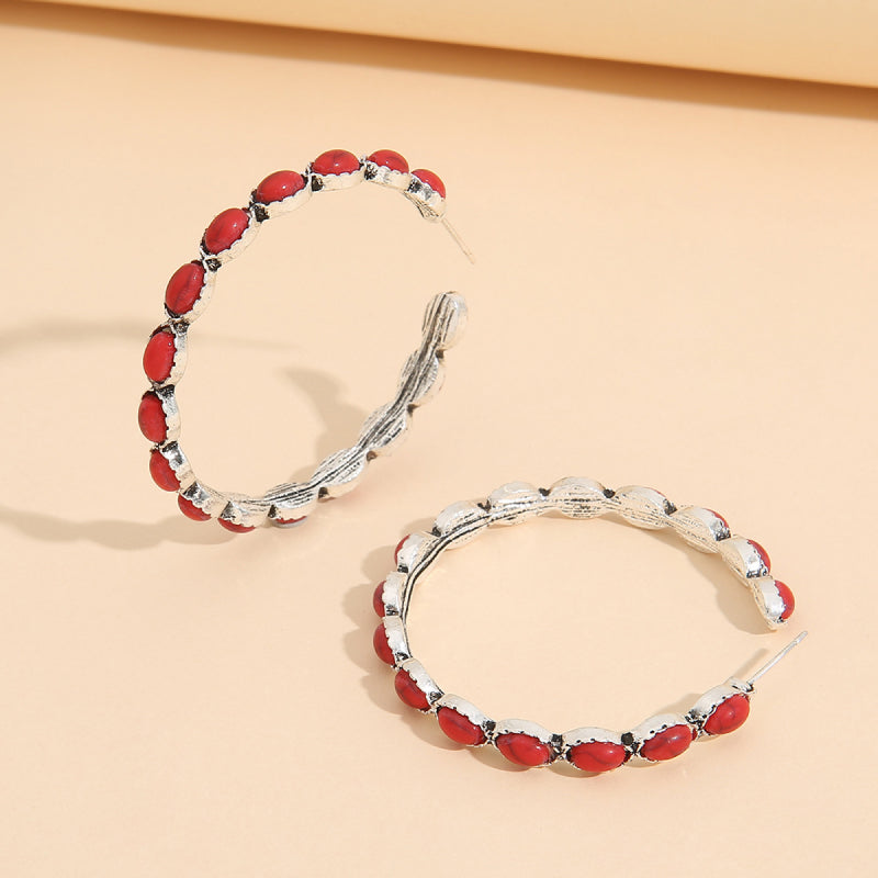 Red stone hoop earrings with textured silver alloy setting