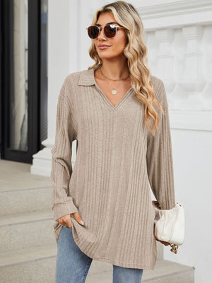 Dust Storm ribbed knit collared tunic with slit hem and long sleeves.