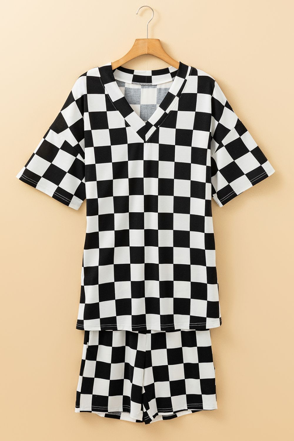 Black and white checkered V-neck t-shirt and shorts outfit set