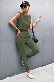 Army green cropped muscle tank and jogger set with elastic waistband and cuffs.