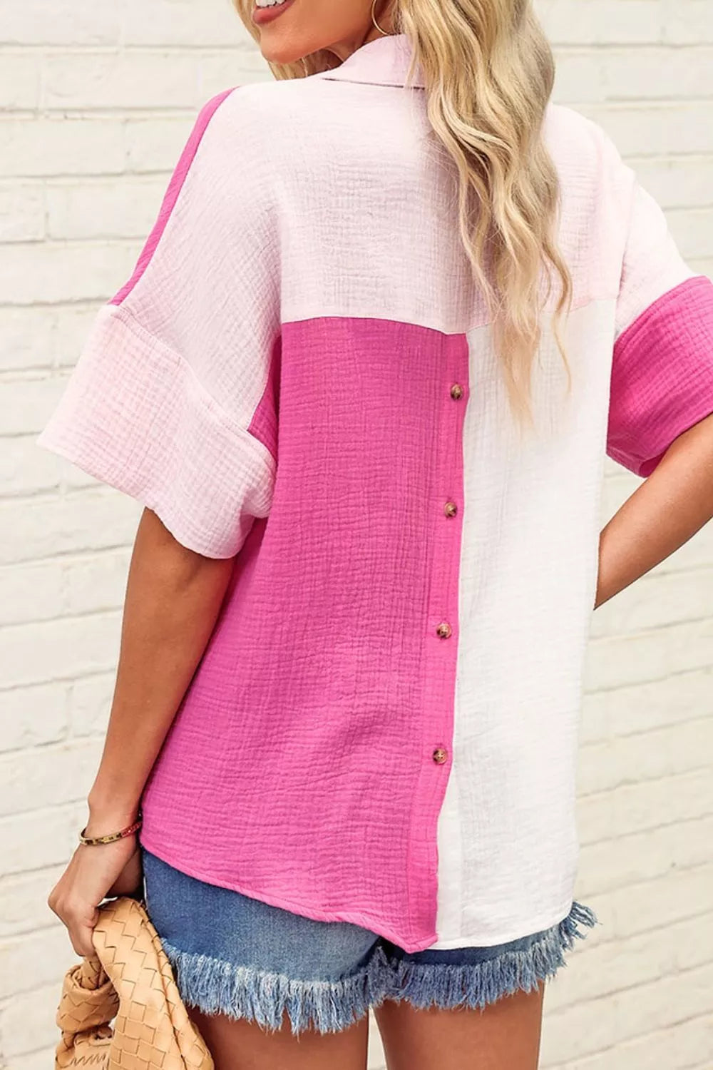 Cotton color block casual shirt with button front and short sleeves.