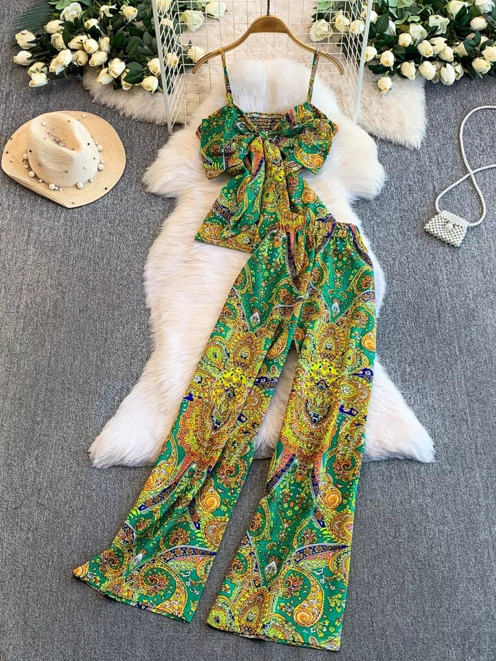 Green paisley print cami and wide-leg pant set with a knotted front detail.