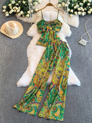 Green paisley print cami and wide-leg pant set with a knotted front detail.