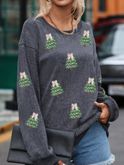 Dark gray baggy sweatshirt with allover sequin Christmas trees and pink bows.