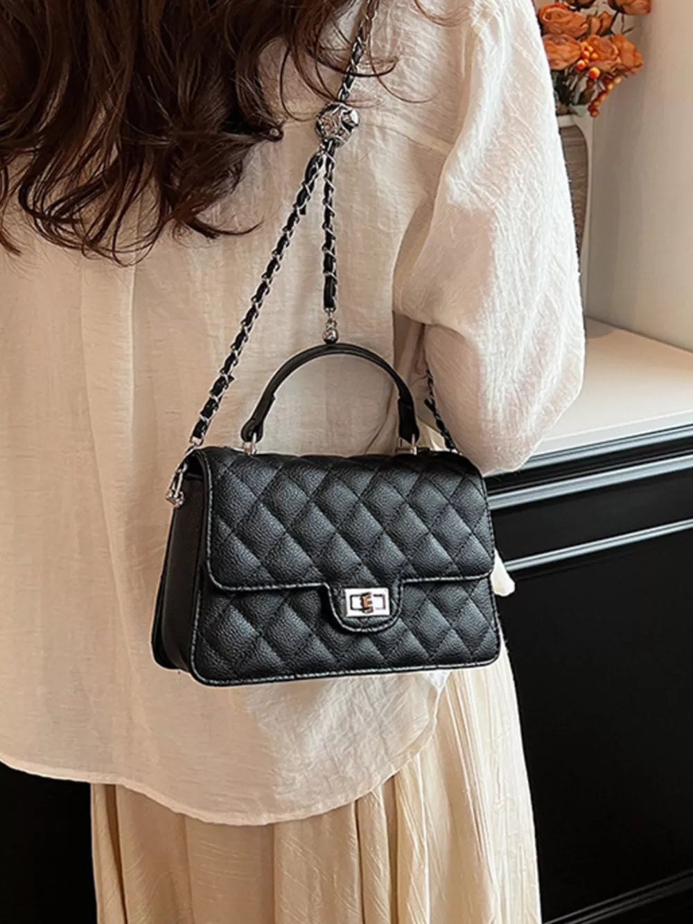 Quilted Chain Strap Crossbody Bag in Black, editorial view