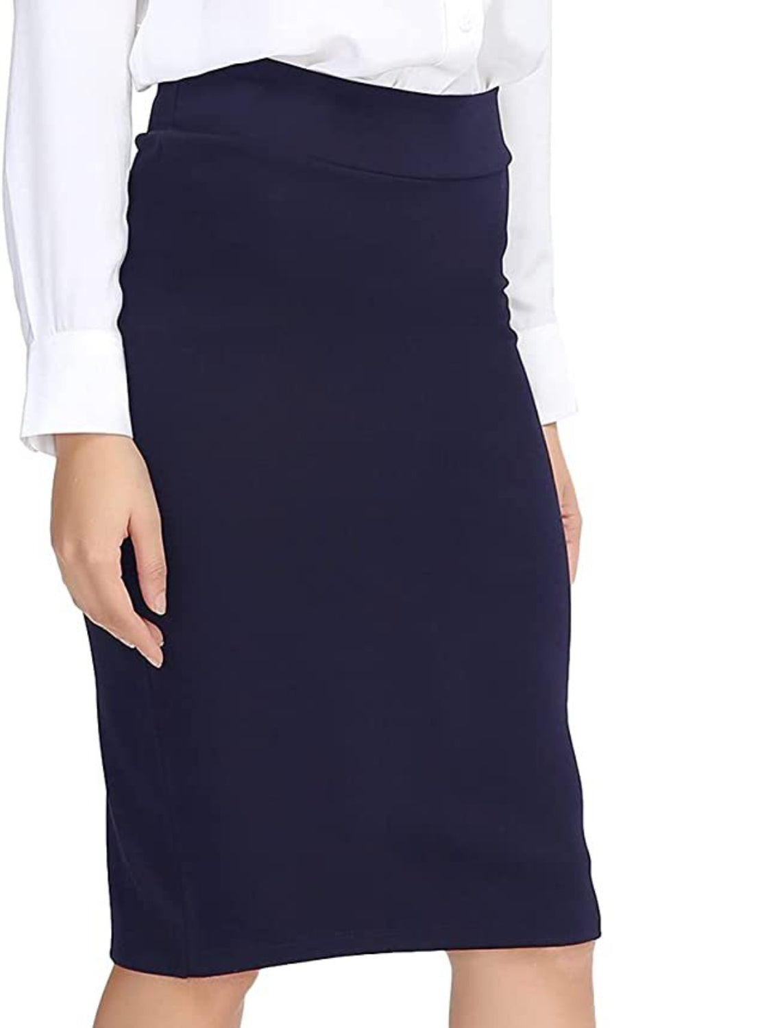 Dark blue sculpted pencil skirt with a high waist, styled with a white button-down shirt.