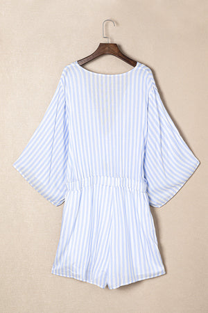 Light blue and white striped tie-front kimono jumpsuit with elastic waist and short legs.