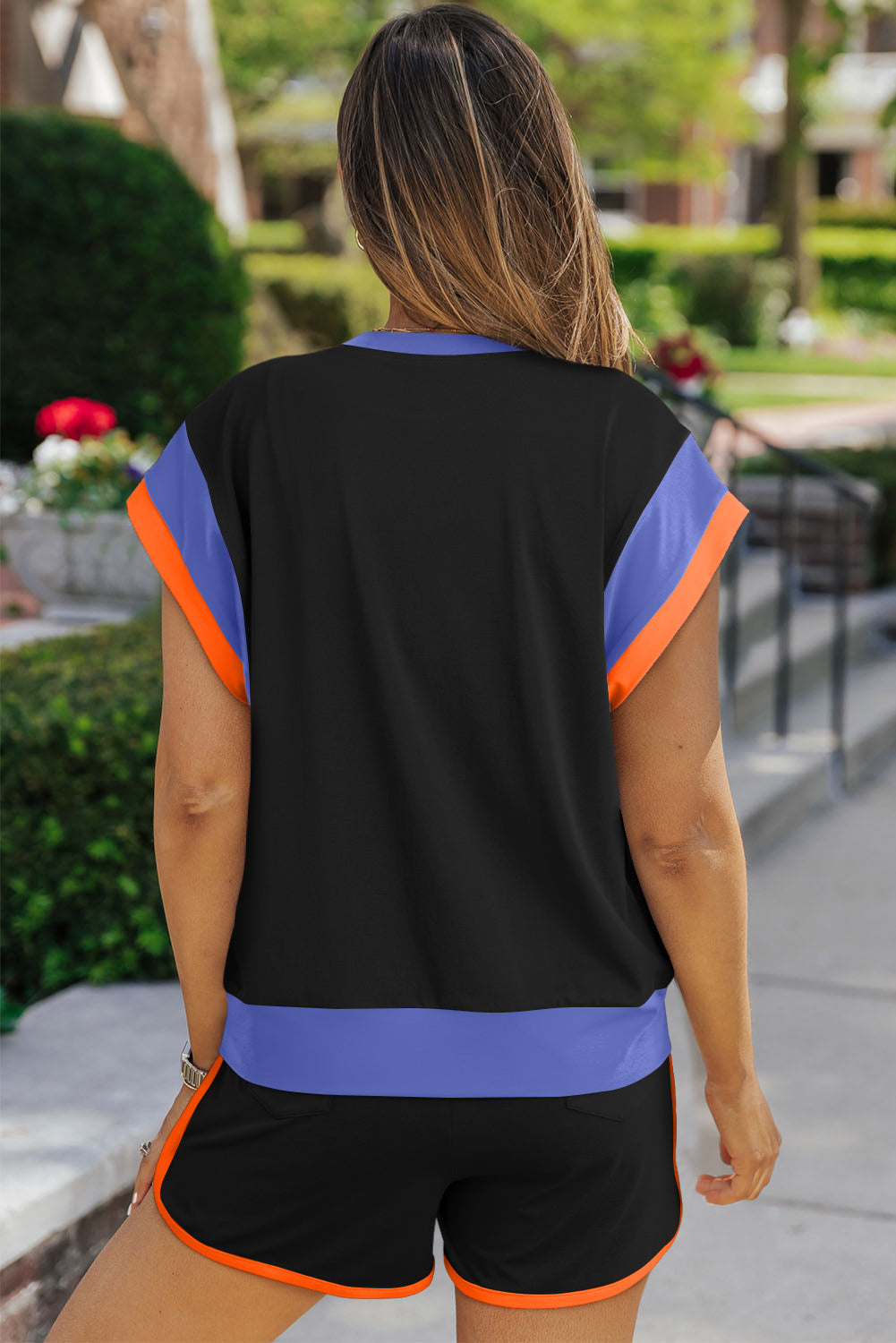 Black lounge set with colorblock sleeves and contrast trim shorts.