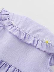 Lavender cotton dress with Peter Pan collar, ruffles, and daisy embroidery.