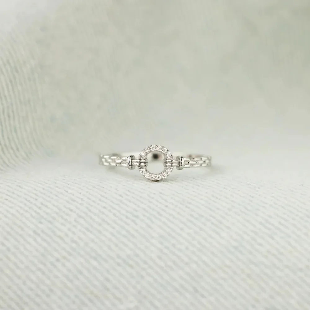 Silver pavé oval chain link ring with baguette accents