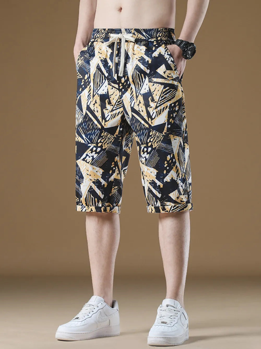 Men's geometric print drawstring shorts with cuffed hem in cotton.