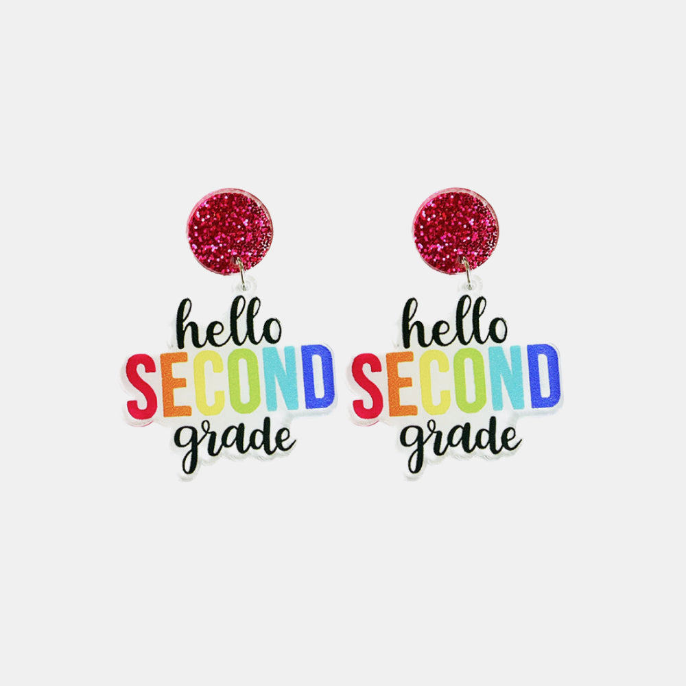 Acrylic graphic drop earrings with pink glitter tops and colorful "hello SECOND grade" text.