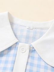 Sky blue gingham toddler dress with white collar and button detail.