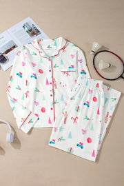 White festive print pajama set with red piping and collar.