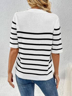 White knit top with black stripes and button shoulder detail