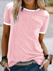 Pink t-shirt with white contrast trim, relaxed fit, short sleeves, and crew neck.