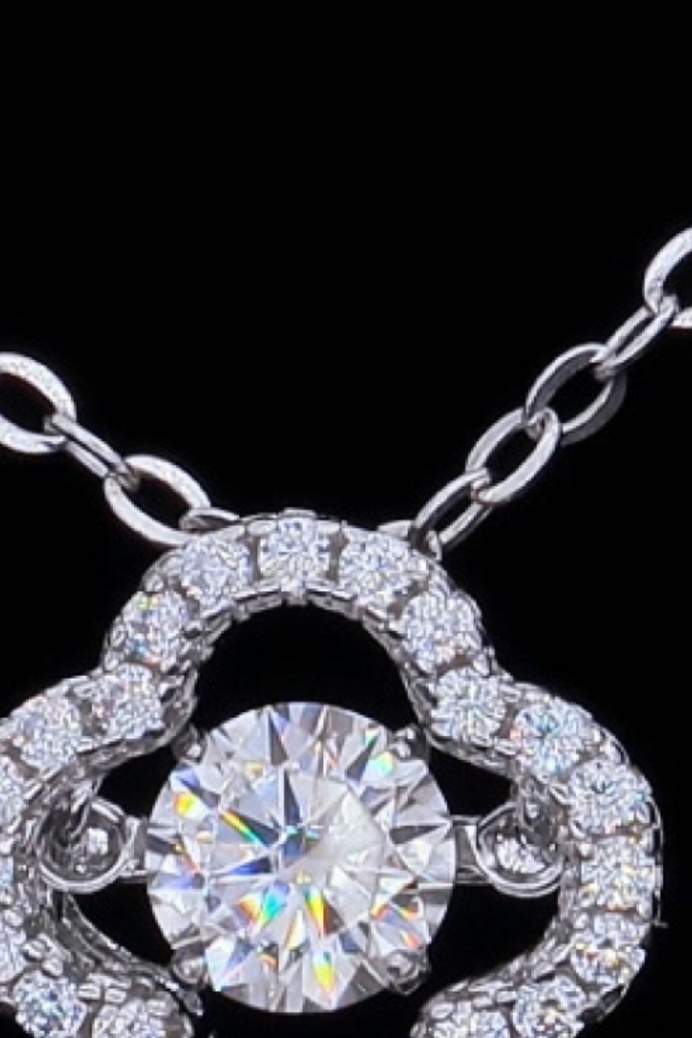 Silver pendant necklace with clover cut moissanite and diamond accents