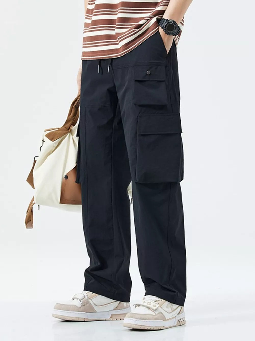 Black utility cargo sweatpants with multiple pockets and drawstring waist.