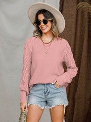 Dusty pink diamond-cut raglan knit sweater with crew neck and long sleeves.