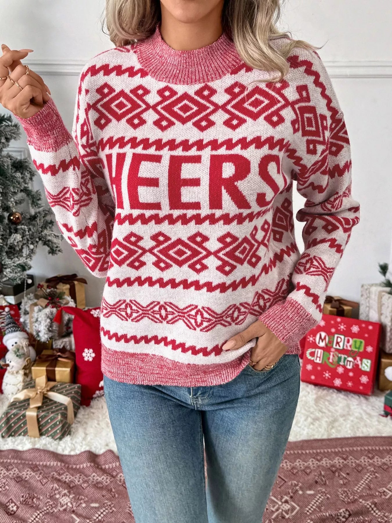 Red and white knit sweater with "CHEERS" graphic and Fair Isle pattern.
