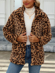 Leopard sherpa overshirt jacket with button front, styled with a white turtleneck and jeans.