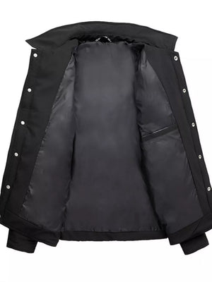 Black puffer jacket interior with satin lining and inner pocket.