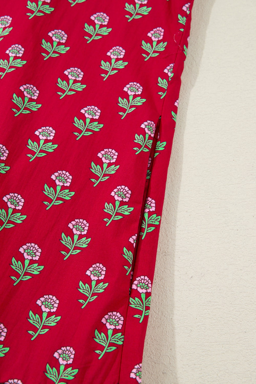 Red cotton mini dress with pink floral print and side slit