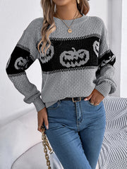Gray acrylic knit sweater with jack-o'-lantern intarsia pattern and crew neck.