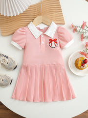 Pink baby dress with white collar, short sleeves, and baseball embroidery.