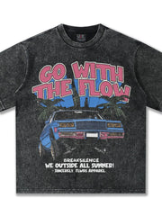 Vintage graphic oversized men's tee in black with "Go With The Flow" text and car graphic.