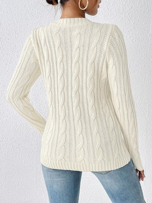 Ivory cable knit sweater with pearl embellishments, acrylic, long sleeves, crew neck.