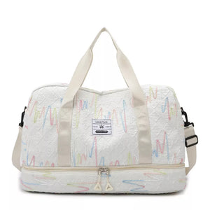 Textured off-white Oxford duffel bag with colorful wave pattern and dual compartments.
