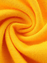 Yellow t-shirt fabric detail, soft knit texture, perfect for baby clothes.