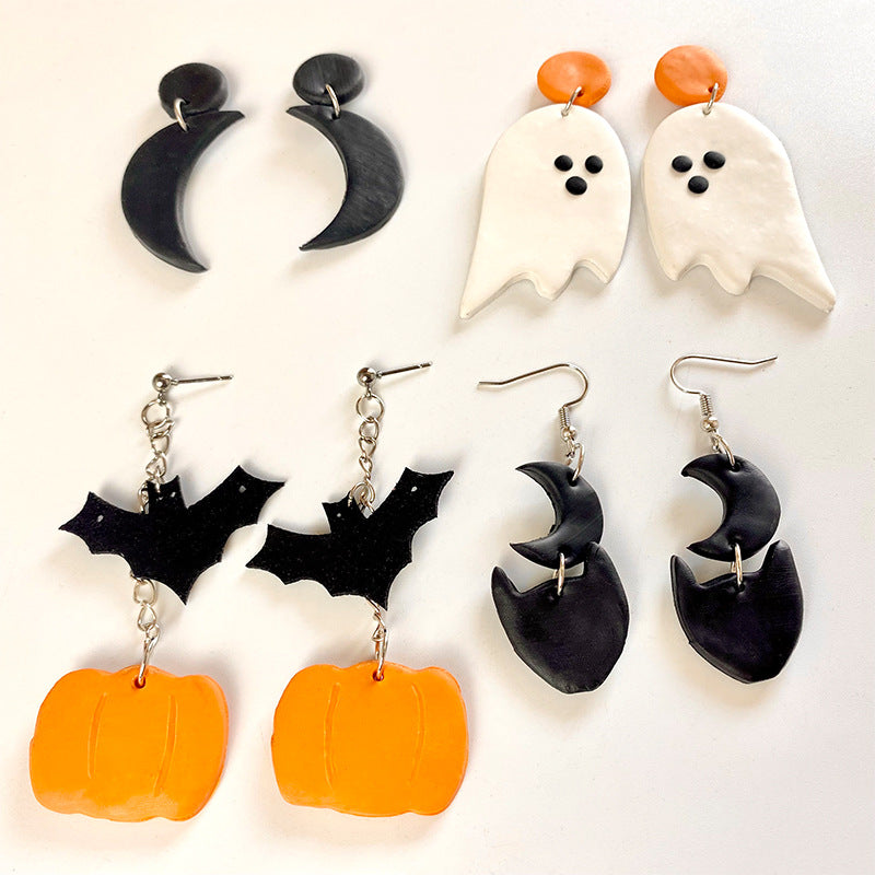 Halloween charm drop earrings with moons, ghosts, bats, and pumpkins.