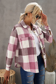 Oversized shacket with a pink and white plaid pattern, button-down front, and two patch pockets.