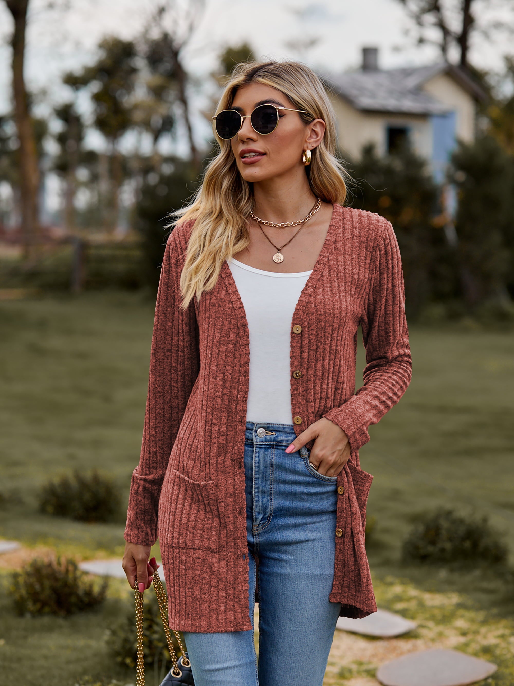Longline ribbed knit button-down cardigan in rust with pockets and a v-neck.