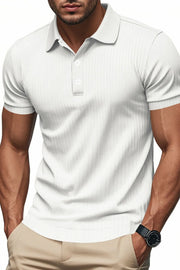 White ribbed polo shirt with short sleeves and a buttoned collar.