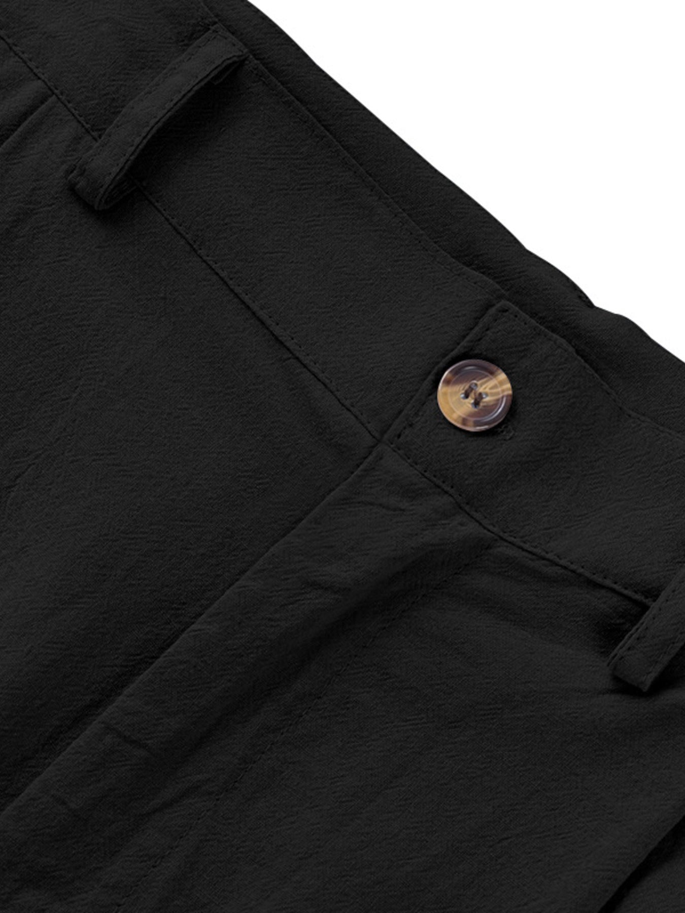 Black relaxed fit sweatpants with textured fabric and button closure detail.
