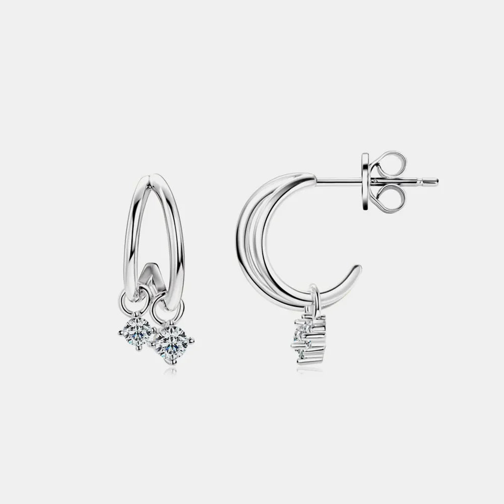 Silver cubic drop hoop earrings with clear cubic zirconia charms.