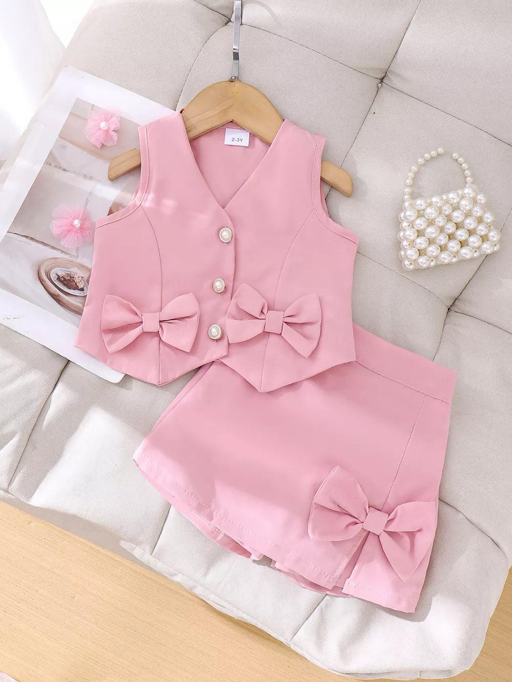Children's Bow Button Up Vest And Skirt Set in Pink, front view